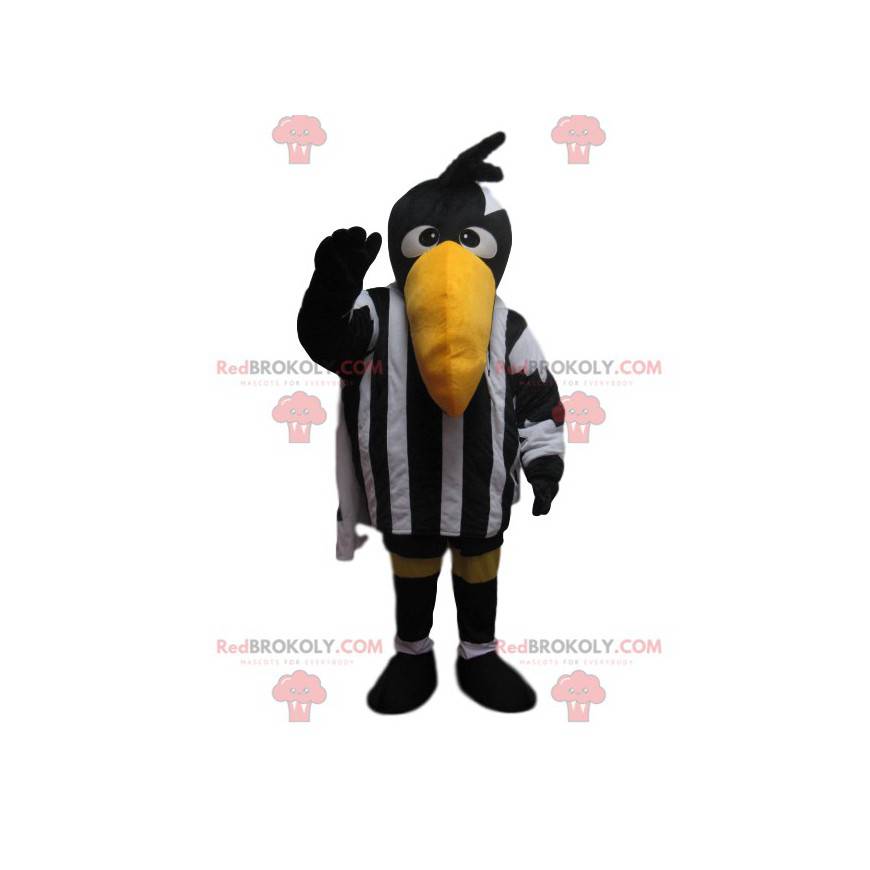 Mascotte de corbeau avec une tenue de sport noire et blanche -