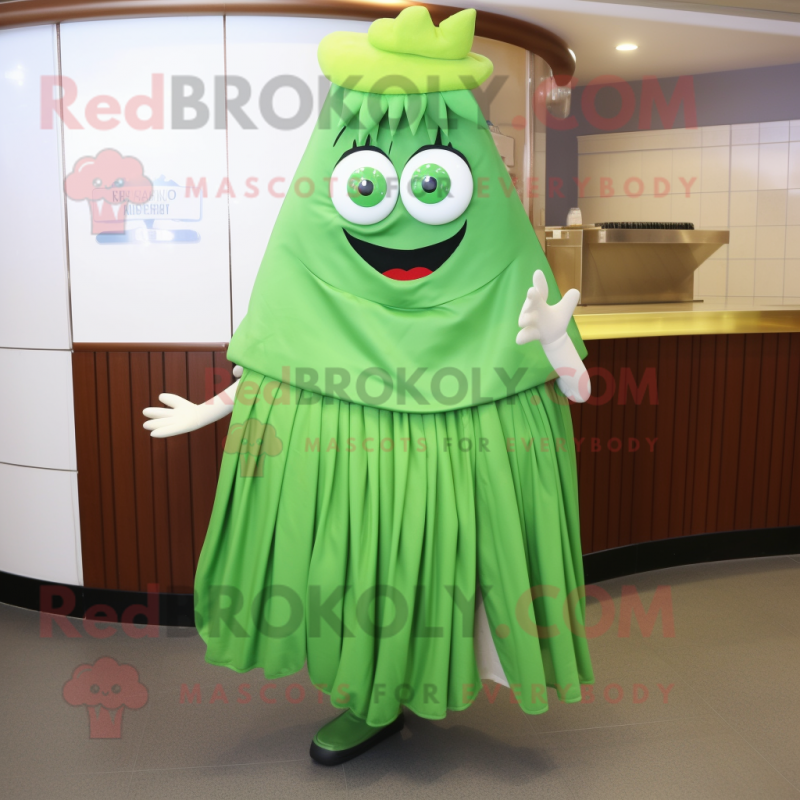 Green Steak mascot costume character dressed with a Pleated Skirt and Shawl pins Green Steak mascot costume character dressed with a Pleated Skirt and Shawl pins
