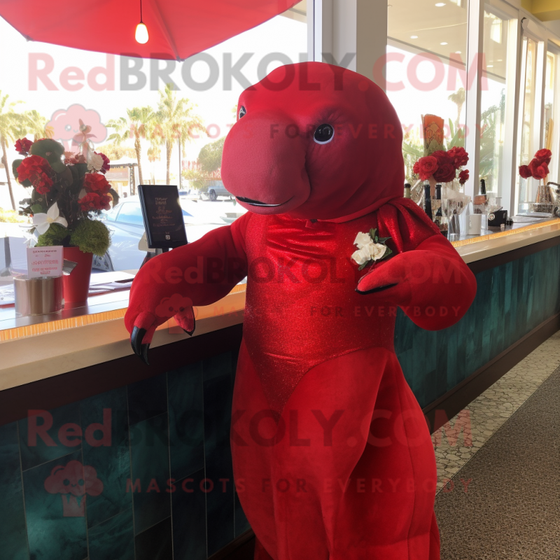 Red Stellar'S Sea Cow mascot costume character dressed with a Cocktail Dress and Handbags