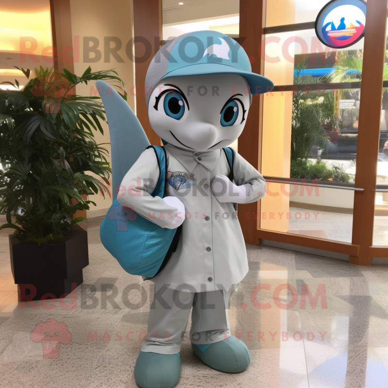 Silver Dolphin mascot costume character dressed with a A-Line Skirt and Messenger bags