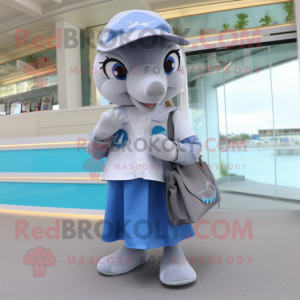Silver Dolphin mascot costume character dressed with a A-Line Skirt and Messenger bags