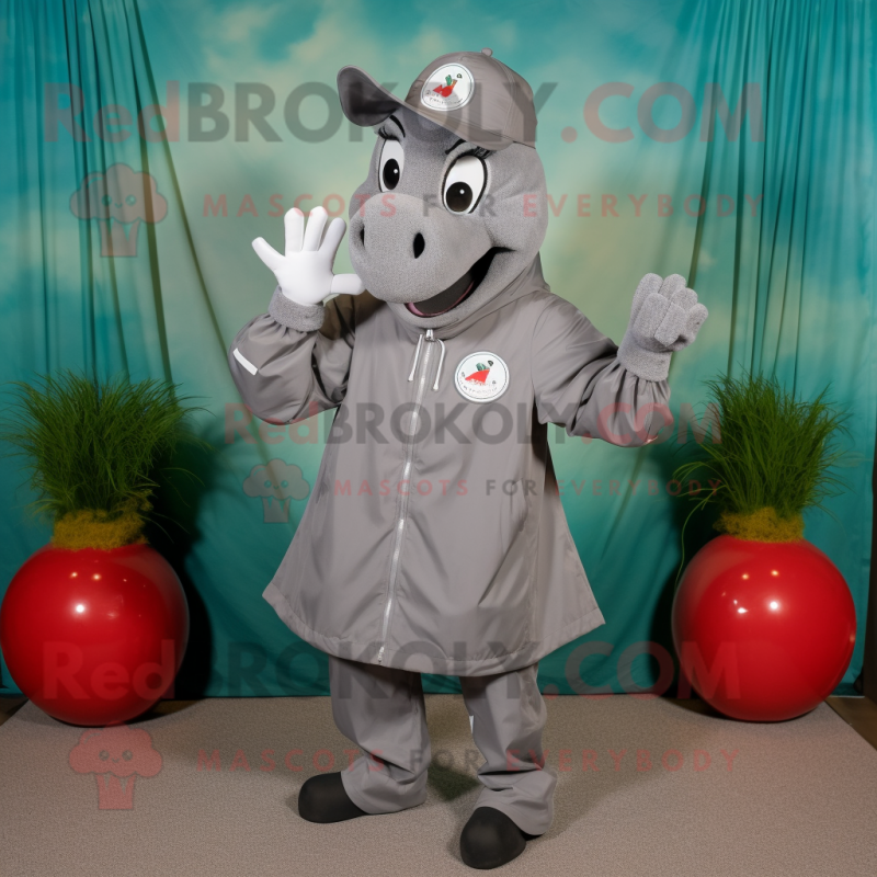 Gray Horseshoe mascot costume character dressed with a Windbreaker and Hat pins Gray Horseshoe mascot costume character dressed with a Windbreaker and Hat pins