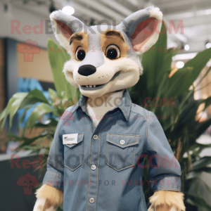 Cream Thylacosmilus mascot costume character dressed with a Denim Shirt and Pocket squares