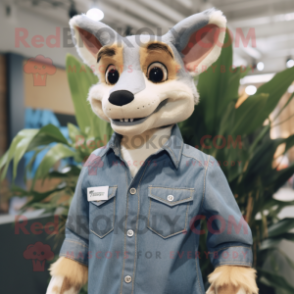 Cream Thylacosmilus mascot costume character dressed with a Denim Shirt and Pocket squares