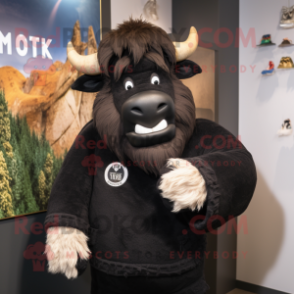 Black Yak mascot costume character dressed with a Sweatshirt and Tie pins