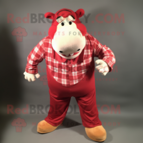 Red Hippopotamus mascot costume character dressed with a Flannel Shirt and Shoe clips