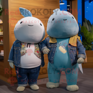 Tan Narwhal mascot costume character dressed with a Boyfriend Jeans and Necklaces