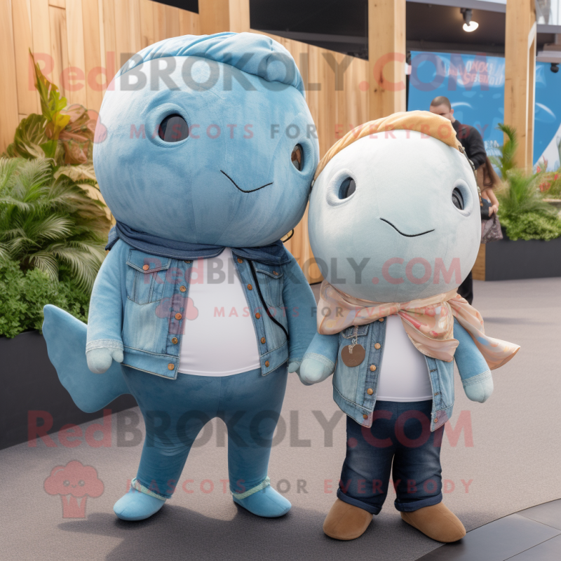 Tan Narwhal mascot costume character dressed with a Boyfriend Jeans and Necklaces Tan Narwhal mascot costume character dressed with a Boyfriend Jeans and Necklaces