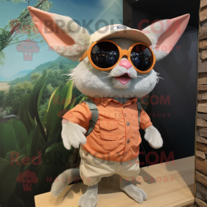 Peach Chinchilla mascot costume character dressed with a Bermuda Shorts and Eyeglasses
