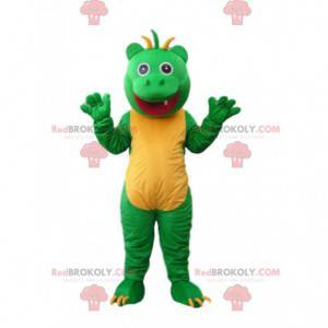 Divertida mascota monstruo verde y amarillo con flequillo en la