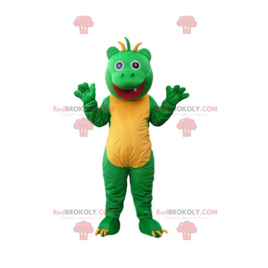 Divertida mascota monstruo verde y amarillo con flequillo en la