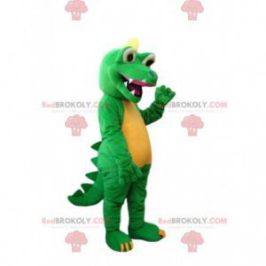 Mascotte dinosauro verde e giallo con un enorme sorriso -