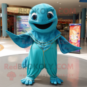 Turquoise Manta Ray mascot costume character dressed with a Corduroy Pants and Anklets