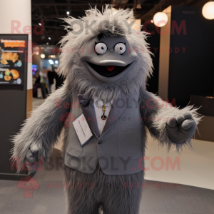 Gray Momentum mascot costume character dressed with a Suit Jacket and Shawl pins
