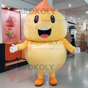 Peach Dim Sum mascot costume character dressed with a Shorts and Foot pads