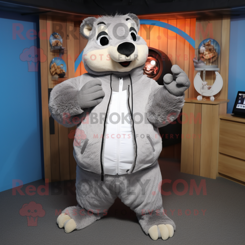 Gray Marmot mascot costume character dressed with a Sweatshirt and Rings