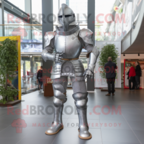 Silver Medieval Knight mascot costume character dressed with a Jeggings and Foot pads