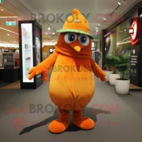 Orange Kiwi mascot costume character dressed with a Long Sleeve Tee and Hat pins