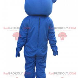 Mascote urso azul com gravata borboleta vermelha -