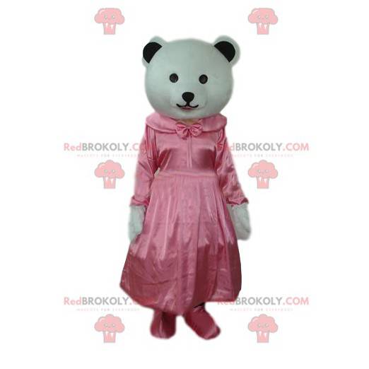 Mascotte d'oursonne blanche avec une robe rose en satin -