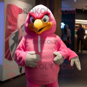 Pink Eagle mascot costume character dressed with a Sweatshirt and Wraps