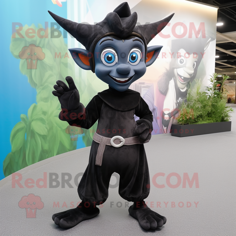 Black Elf mascot costume character dressed with a Jumpsuit and Clutch bags Black Elf mascot costume character dressed with a Jumpsuit and Clutch bags