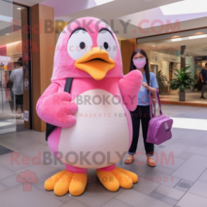 Pink Penguin mascot costume character dressed with a Skinny Jeans and Clutch bags