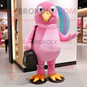 Pink Penguin mascot costume character dressed with a Skinny Jeans and Clutch bags