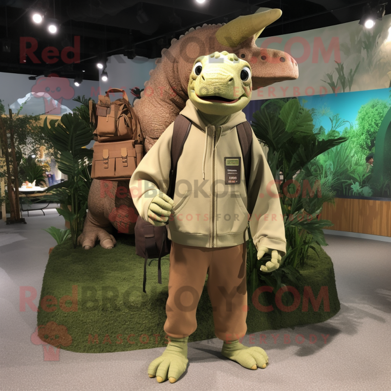 Tan Iguanodon mascot costume character dressed with a Sweatshirt and Handbags Tan Iguanodon mascot costume character dressed with a Sweatshirt and Handbags