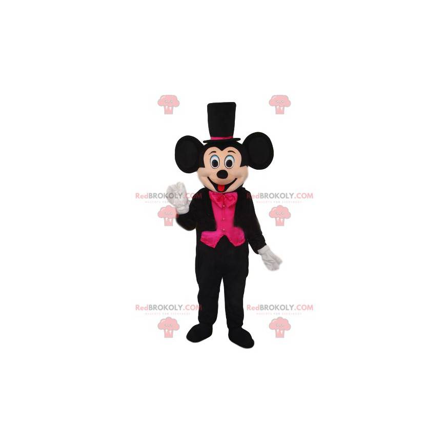 Mascotte Mickey Mouse met een elegant zwart en fuchsia kostuum