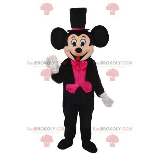 Mascotte Mickey Mouse met een elegant zwart en fuchsia kostuum