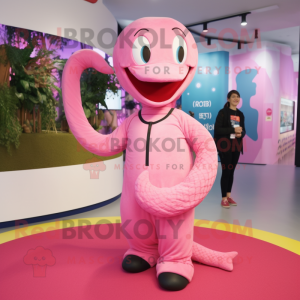 Pink Snake mascot costume character dressed with a Long Sleeve Tee and Suspenders