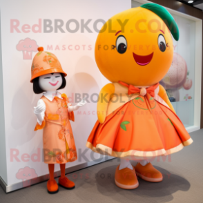 Peach Mandarin mascot costume character dressed with a Mini Dress and Watches