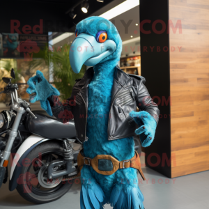 Turquoise Dodo Bird mascot costume character dressed with a Biker Jacket and Shawls