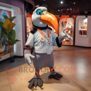 Silver Toucan mascot costume character dressed with a Chinos and Earrings