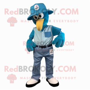 Cyan Flamingo mascot costume character dressed with a Bootcut Jeans and Caps