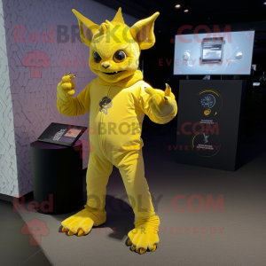 Yellow Gargoyle mascot costume character dressed with a Romper and Smartwatches