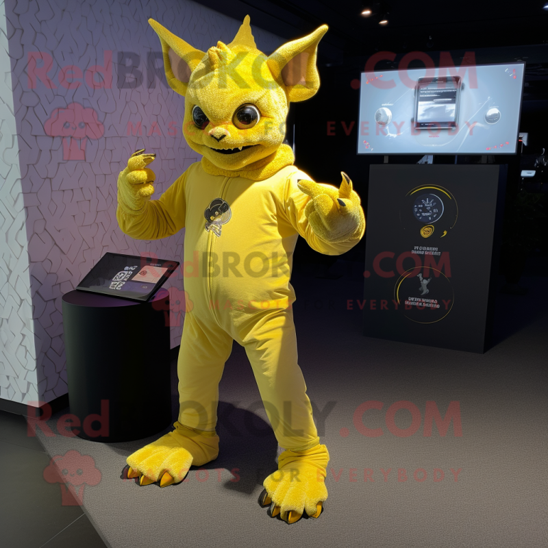 Yellow Gargoyle mascot costume character dressed with a Romper and Smartwatches Yellow Gargoyle mascot costume character dressed with a Romper and Smartwatches