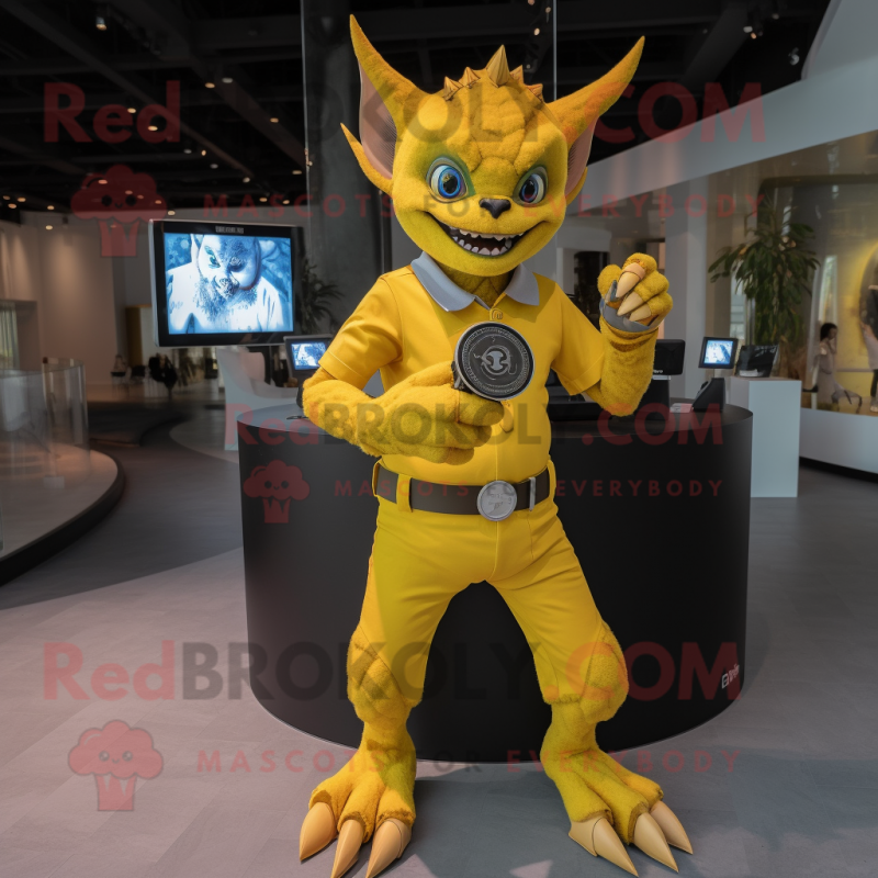 Yellow Gargoyle mascot costume character dressed with a Romper and Smartwatches