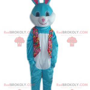 Blå og hvit kaninmaskot med et hyggelig smil - Redbrokoly.com