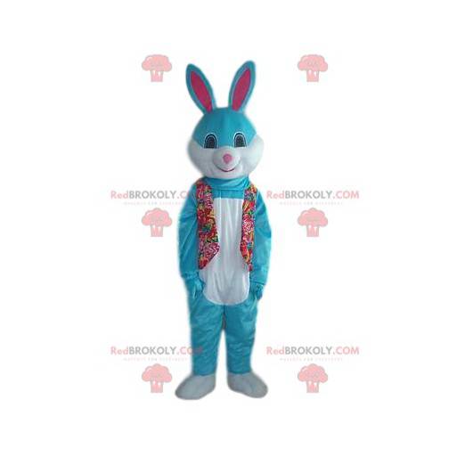 Mascota del conejo azul y blanco con una bonita sonrisa -