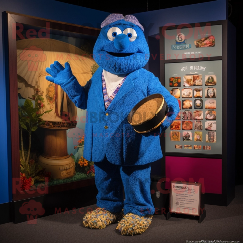 Blue Jambalaya mascot costume character dressed with a Suit and Coin purses Blue Jambalaya mascot costume character dressed with a Suit and Coin purses
