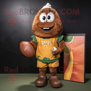 Rust Mango mascot costume character dressed with a Rugby Shirt and Coin purses