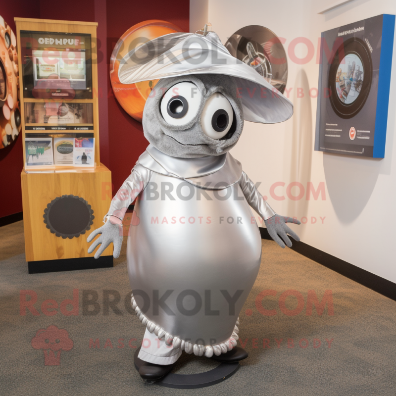Silver Plate Spinner mascot costume character dressed with a Chinos and Shawl pins Silver Plate Spinner mascot costume character dressed with a Chinos and Shawl pins