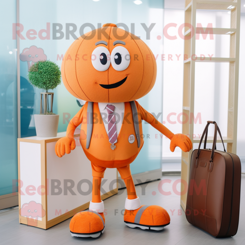 Orange Basketball Ball mascot costume character dressed with a Cardigan and Briefcases Orange Basketball Ball mascot costume character dressed with a Cardigan and Briefcases