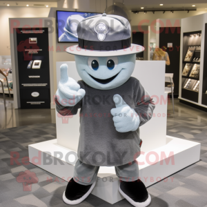 Gray Engagement Ring mascot costume character dressed with a Graphic Tee and Hat pins