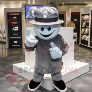 Gray Engagement Ring mascot costume character dressed with a Graphic Tee and Hat pins