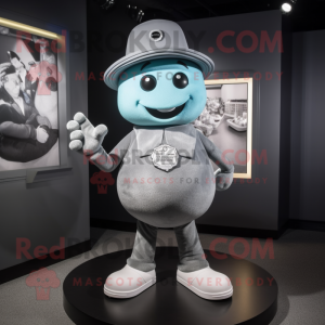 Gray Engagement Ring mascot costume character dressed with a Graphic Tee and Hat pins
