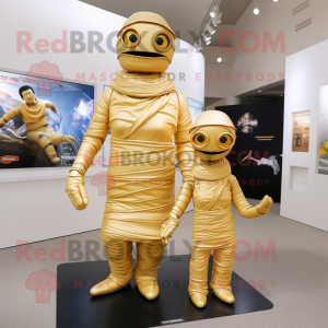 Gold Mummy mascot costume character dressed with a Mom Jeans and Rings