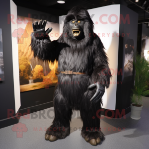 Black Sasquatch mascot costume character dressed with a Jacket and Foot pads